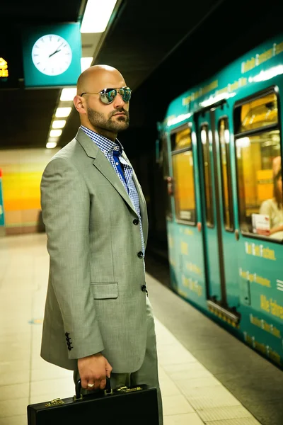 Business Man in Metro Station Waiting for Train