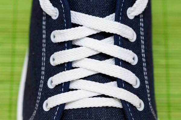 White lace-up fabric sports Shoe