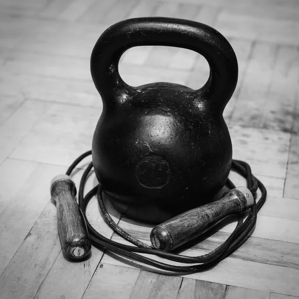 Cast iron kettlebell and leather jump rope