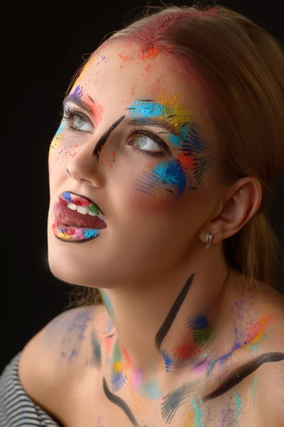 Beautiful woman with art make-up