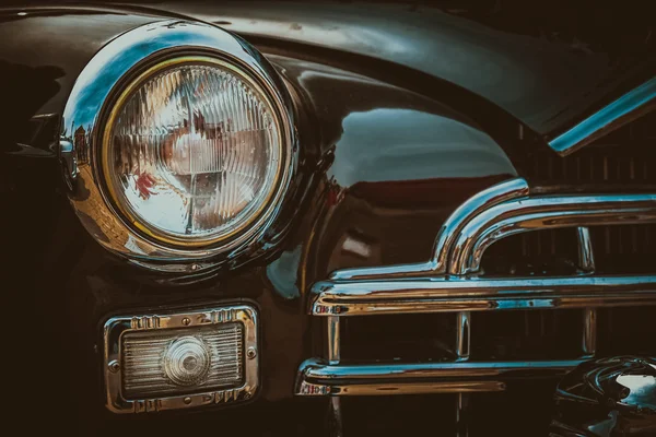 Vintage car headlight. Vintage effect processing