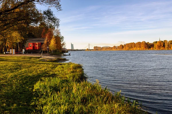 Red house of rescue station and coastline of river Daugava in Riga, Latvia