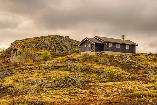 Cabin on hill in Hardangervidda National Park, Norway