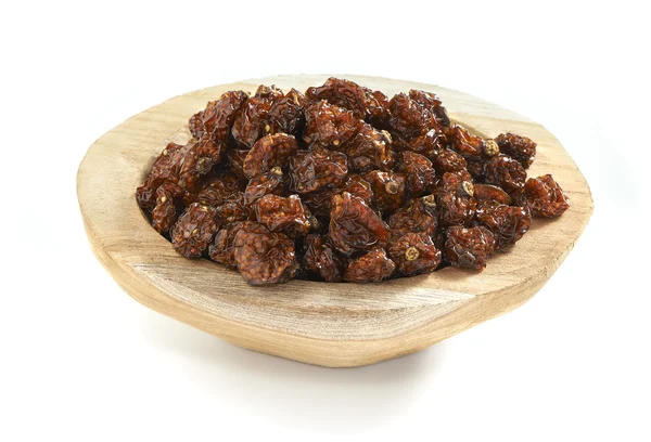 Inca berries in a wooden bowl