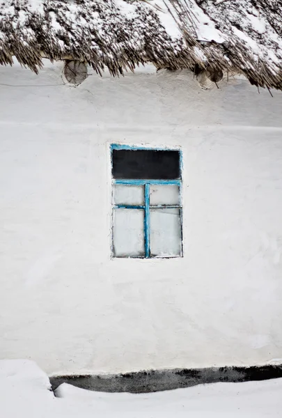 Old window in an earthen house