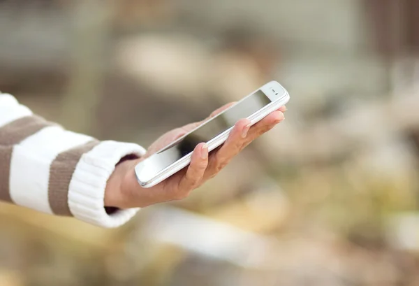 Touch phone in the hands of women