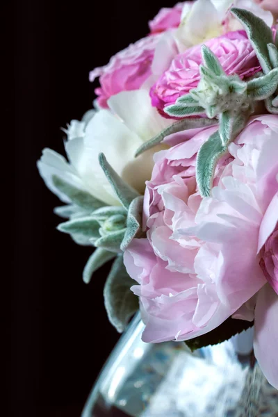 A bouquet of roses peonies