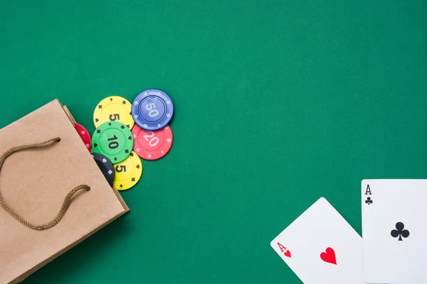 Cardboard bag with poker cards and poker chips