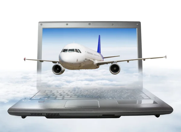 The plane takes off from the laptop screen, soaring in the sky