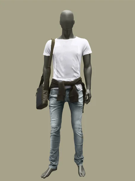 Male mannequin dressed in shirt and blue jeans