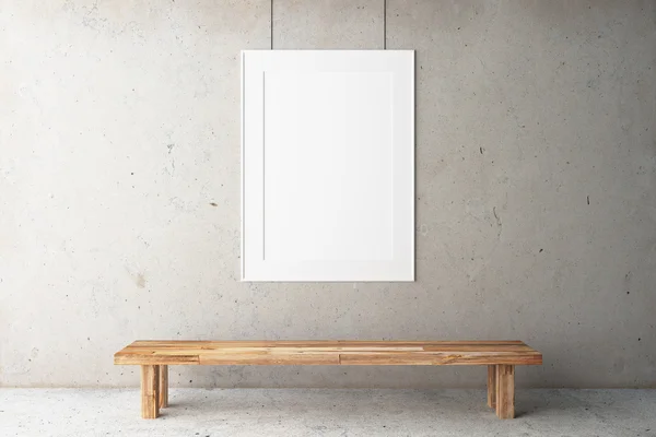 Blank frame on concrete wall