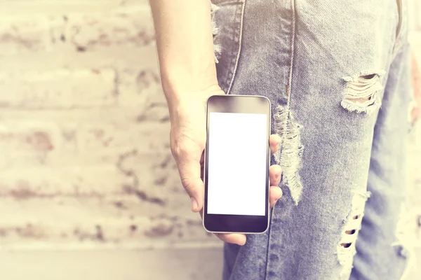 Girl with blank cell phone