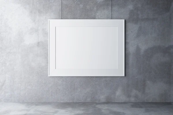 Blank frame on concrete wall