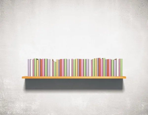 Bookshelf with books on wall