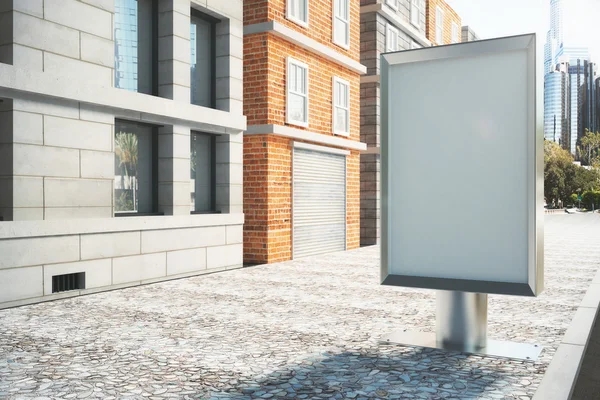 Blank billboard on empty street in the afternoon, mock up