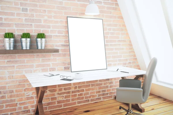 Loft interior with desk and blank picture frame, mock up