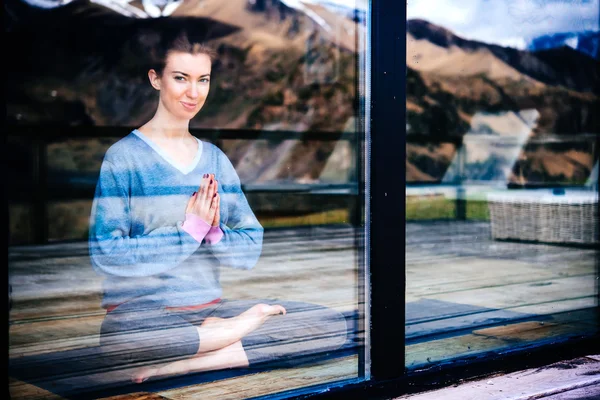 Young woman practicing yoga