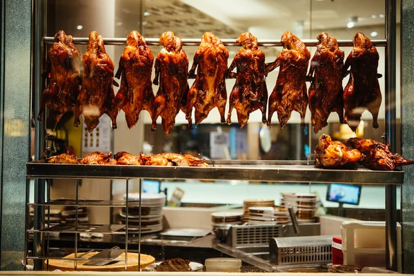 Roasted duck hanging