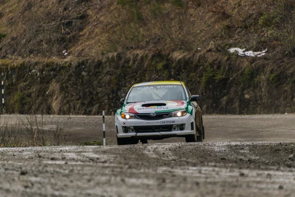 Unknown racer  on the car brand Subaru  overcome the track