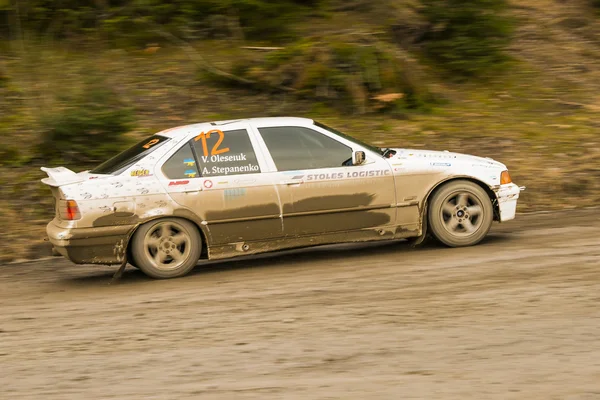 Unknown racer  on the car brand BMW (No.12) overcome the track