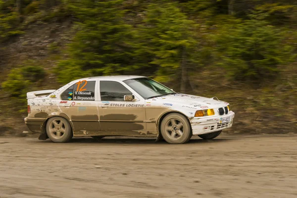 Unknown racer  on the car brand BMW (No.12) overcome the track