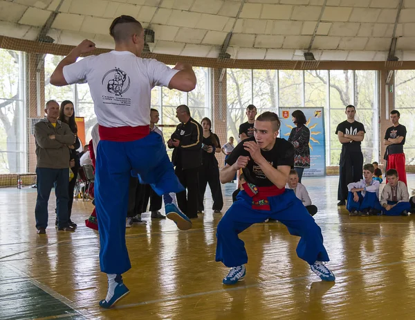 Competitors in the martial arts to perform in the gym