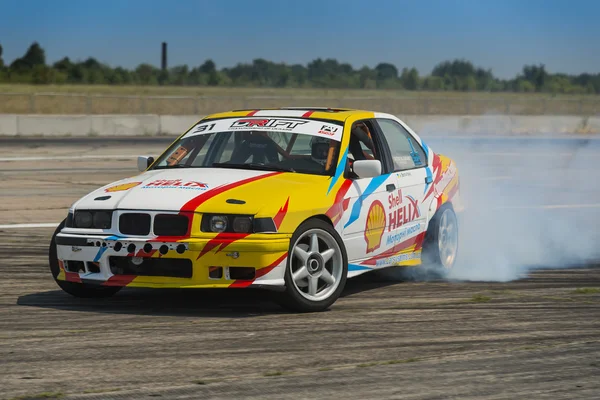Rider V. Borovitsky  on the car brand BMW overcomes the track