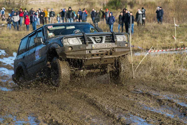 Unknown rider on the off-road vehicle overcomes a route