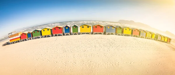 Multicolored beach huts at St James seaside near Simon Town - Atlantic pacific coast near Cape Town in South Africa