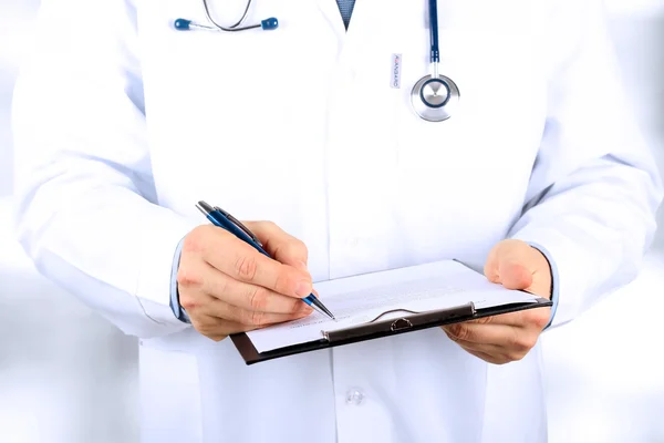 Young medical doctor  with a stethoscope around his neck  holding  a black folder