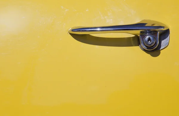 Yellow car door handle