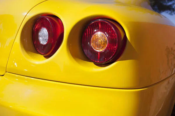 Yelllow sports car spot lights