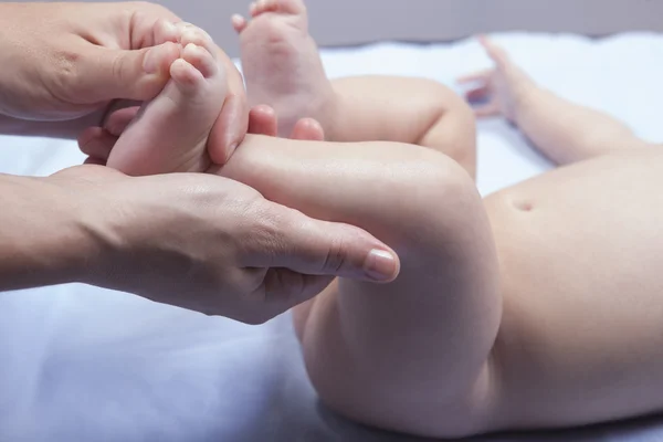 Three month baby boy foot massage