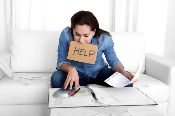 Young woman worried at home in stress accounting desperate in financial problems