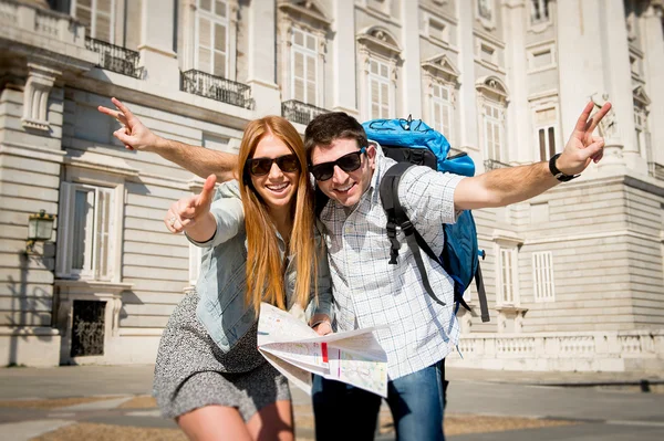 Beautiful friends tourist couple on holidays students exchange tourism concept