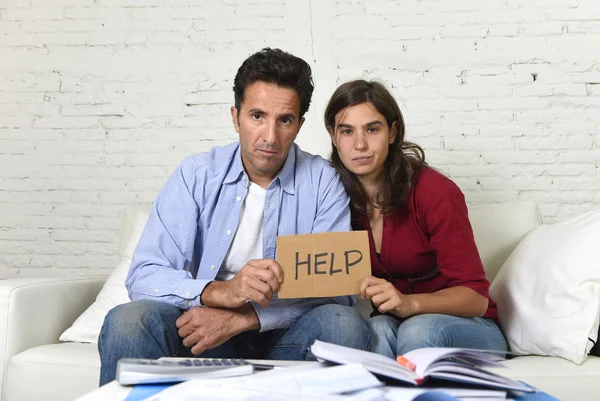 Young couple worried at home in bad financial situation stress asking for help