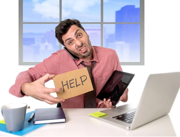 Overwhelmed businessman working on computer laptop asking for help depressed