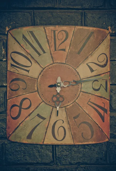 Time concept - the old clock on the grunge background