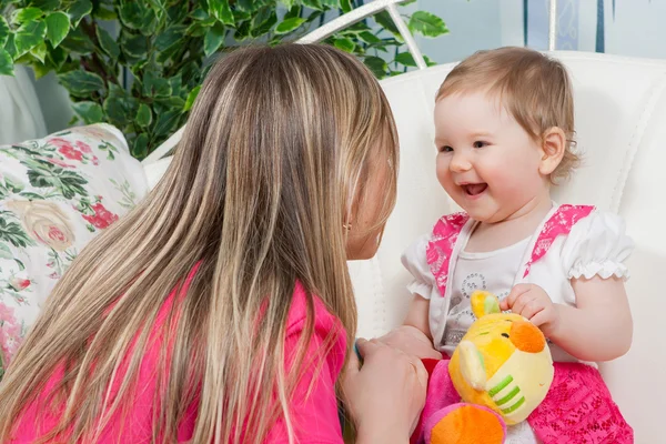 Happy mother with  baby daughter