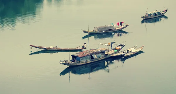 Landscape, row boat,  river, poor Vietnam