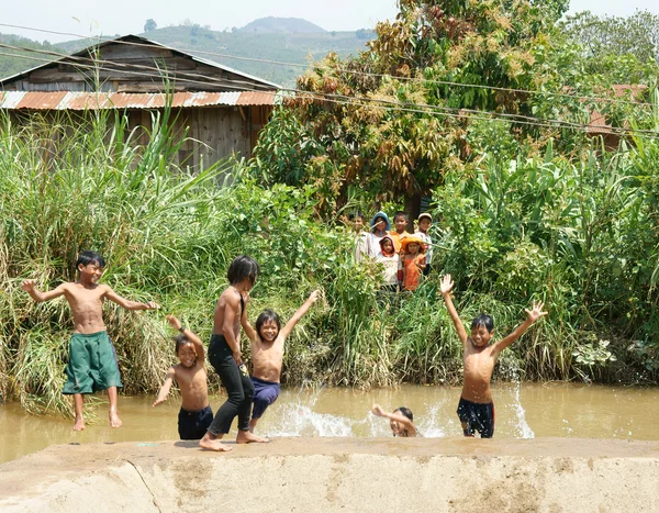 Asian children bath in the river