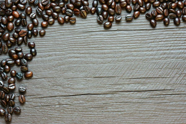 Coffee bean background, wooden texture