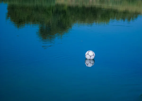 Ball in water