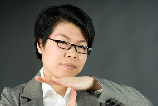 Woman gesturing break sign with hands