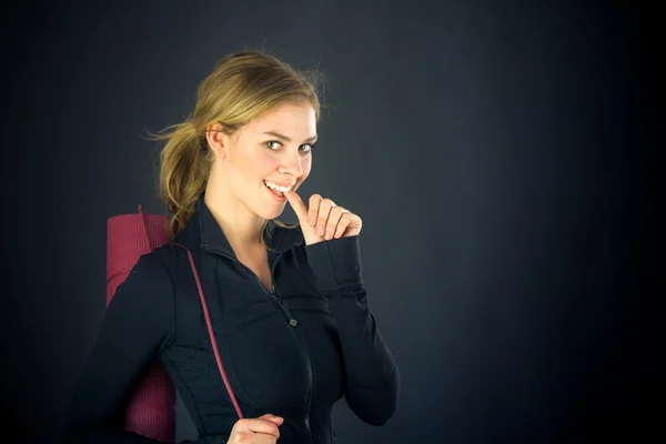 Woman biting finger nails