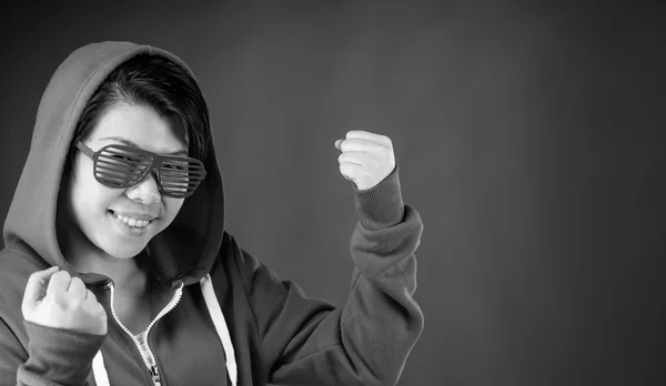 Woman celebrating success with fists up