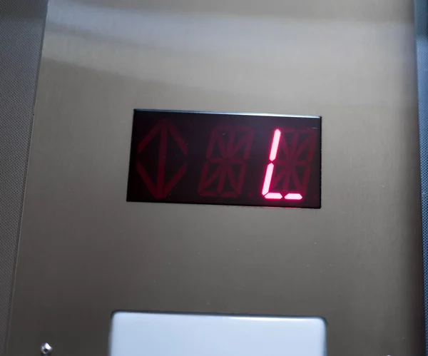 Letter l displaying on digital display of an elevator