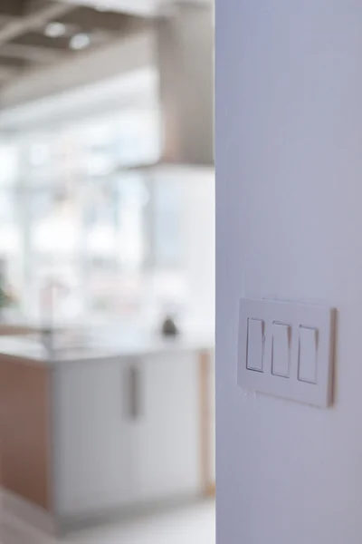 White wall mounted light switch