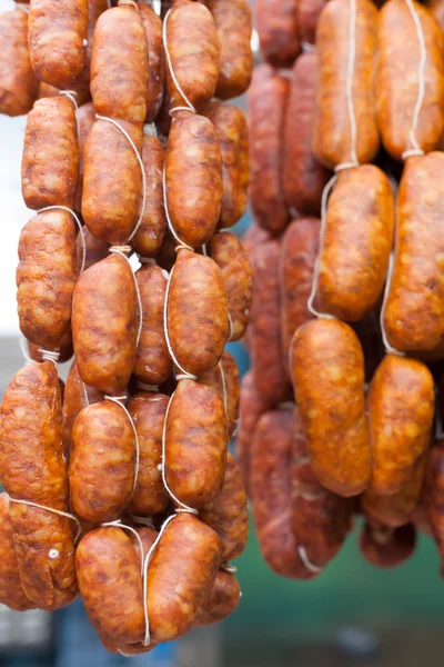 Sausages hanging for sale at market