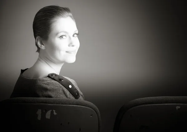 Woman smiling at the cinema